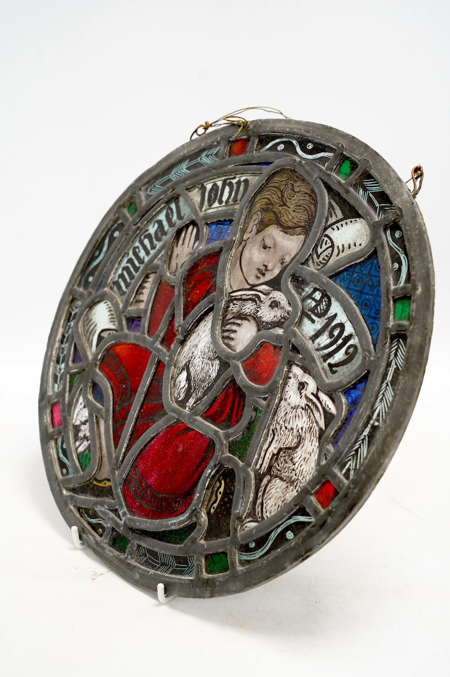 Mabel Esplin (1874–1921), a stained glass roundel with related brochure and letter from artist dated 1912, 33cm. Condition - fair to good